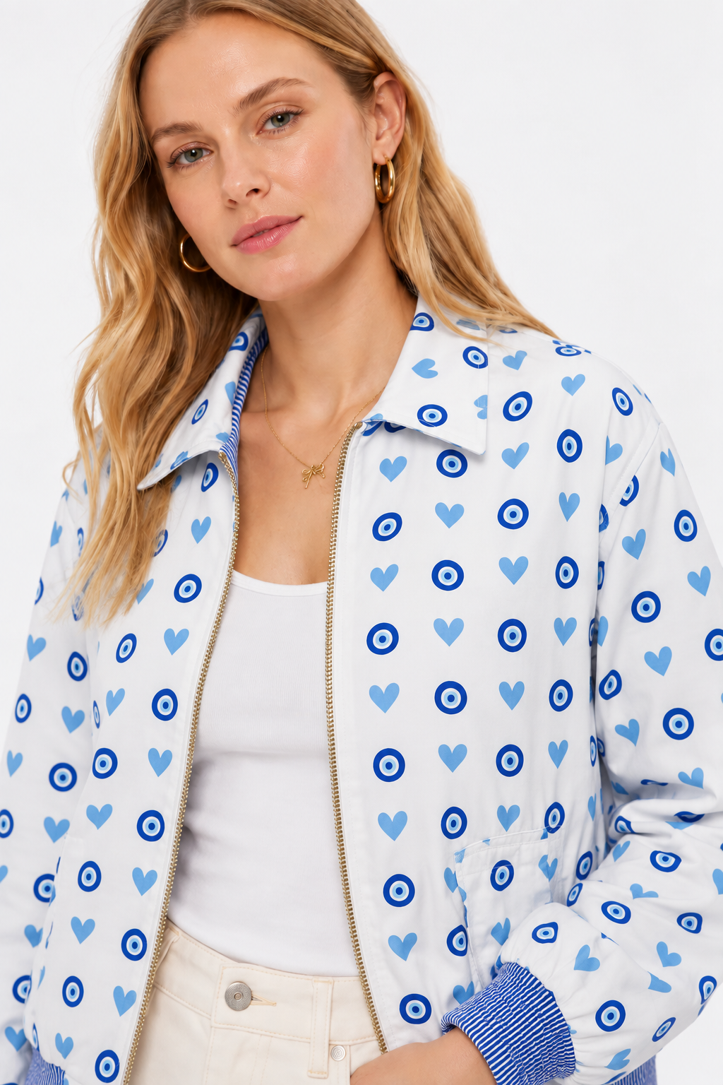 Image of White Reversible Cotton Bomber Jacket with Blue Evil Eye & Heart Print | Ayla