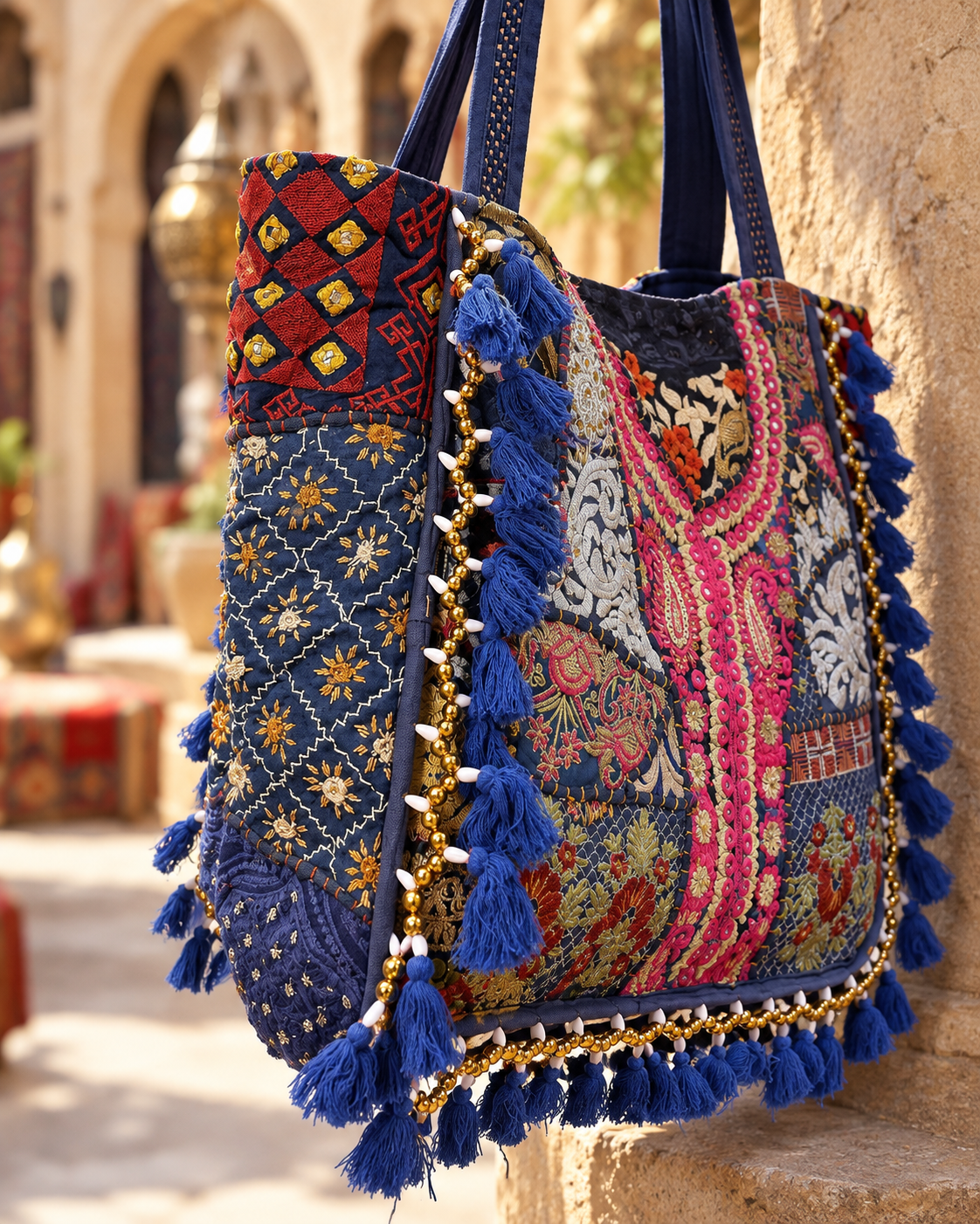 Image of Handmade Embroidered Navy Blue Patchwork Tote Bag with Tassels & Beaded Detailing | Elara