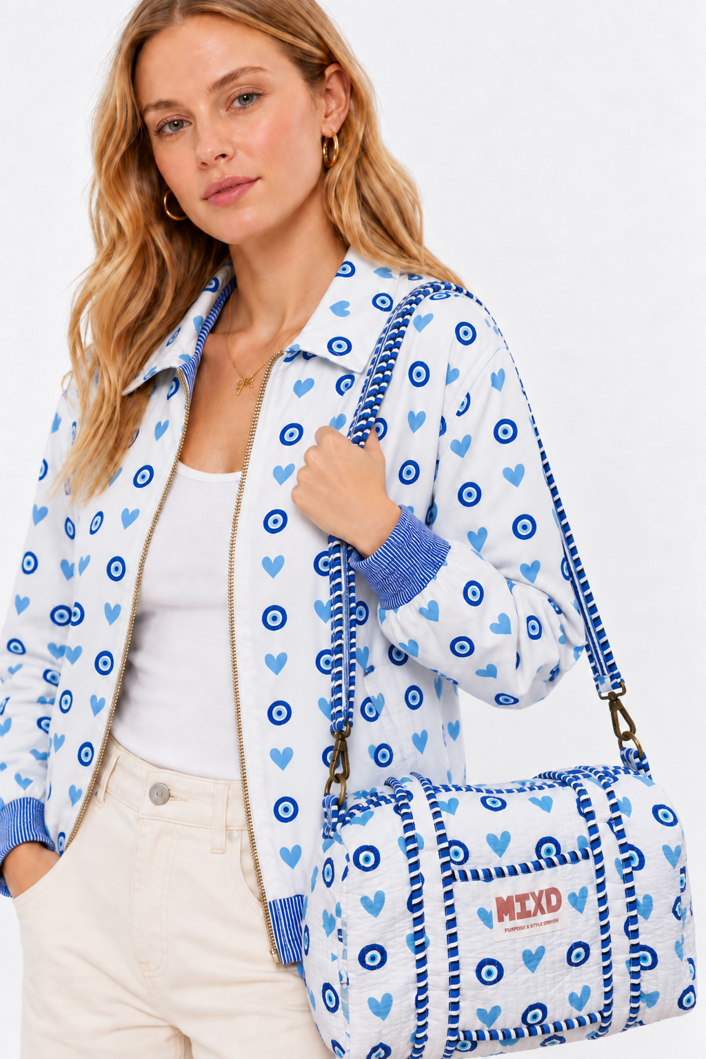 Image of White Quilted Cotton Mini Duffle Bag with Blue Evil Eye & Heart Print | Basma