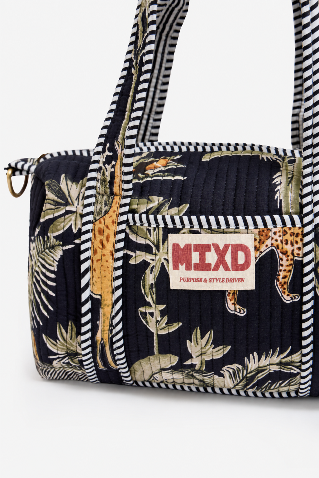 Image of Navy Quilted Cotton Mini Duffle Bag with Safari Print & Striped Handles | Ariadne